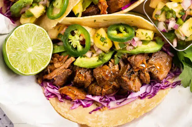 Close-up photo of a pork carnita taco.