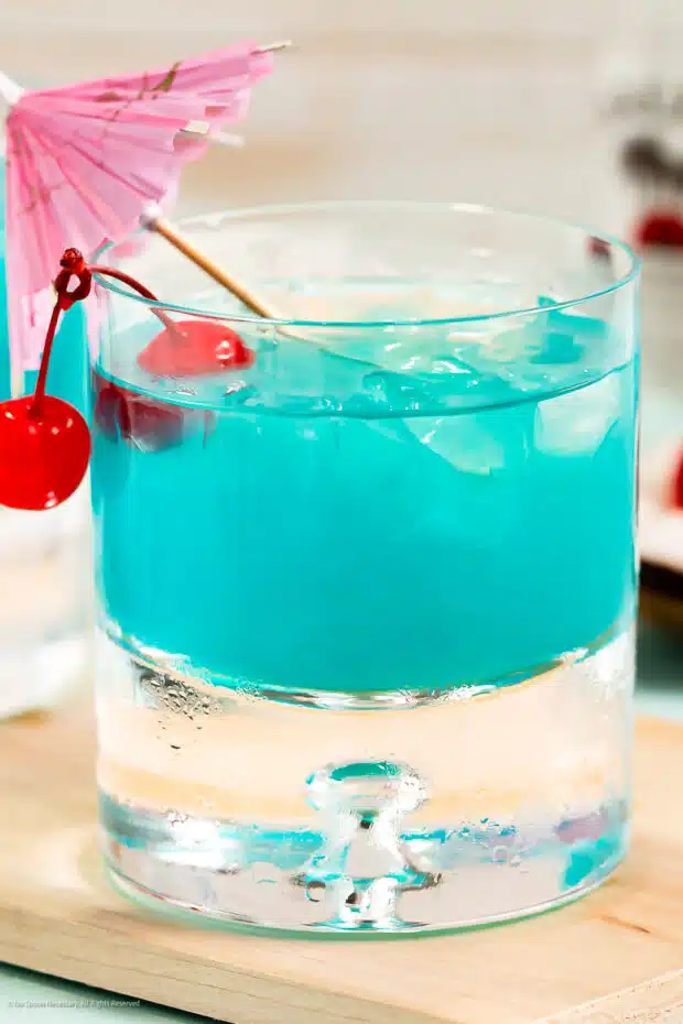 Close-up photo of a blue Hawaiian drink with malibu and curacao.