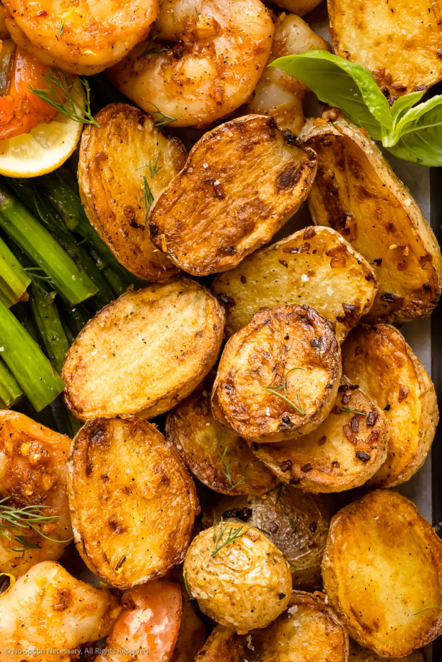 Overhead, close-up photo of roasted petite potatoes.