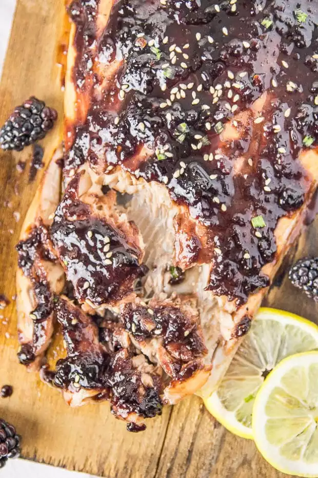 blackberry chipotle glazed BBQ salmon cooked on a grill