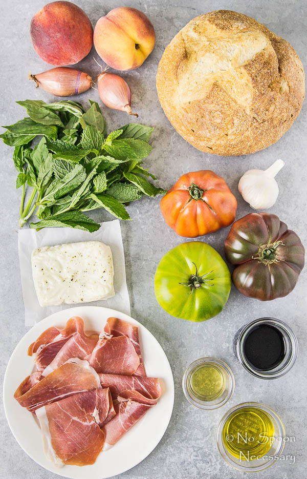 Overhead shot of all the ingredients necessary to make Grilled Halloumi Peach Panzanella with Prosciutto recipe.
