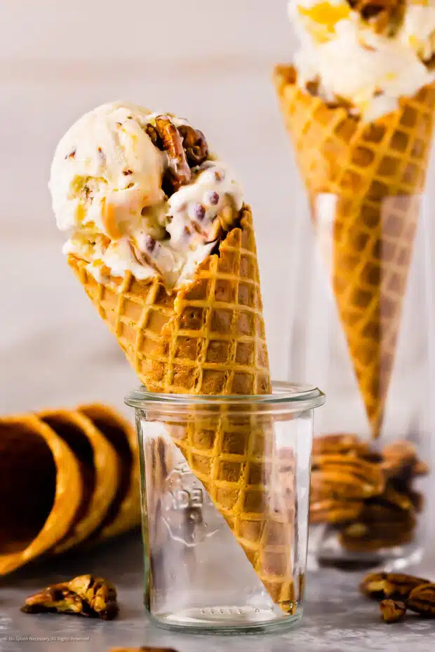Straight on photo of two pecan butter ice cream cones.