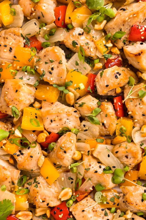 Close-up photo of fully baked recipe for Thai chicken with peppers and onions.