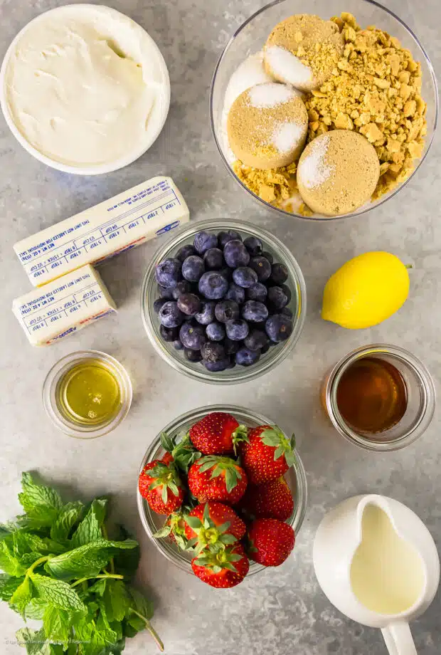 Overhead photo of the ingredients in berry parfaits.