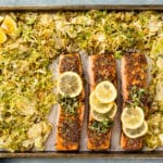 Overhead photo of honey dijon salmon and brussels sprouts on a sheet pan.