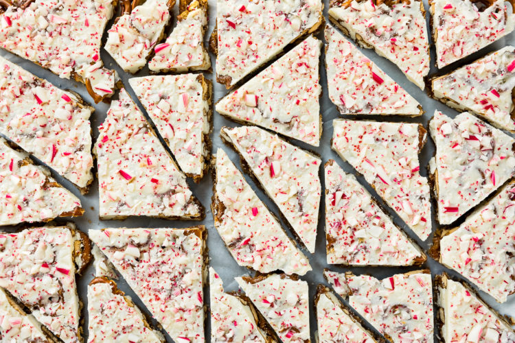 Overhead photo of Peppermint Bark cut into pieces on a piece of parchment paper.