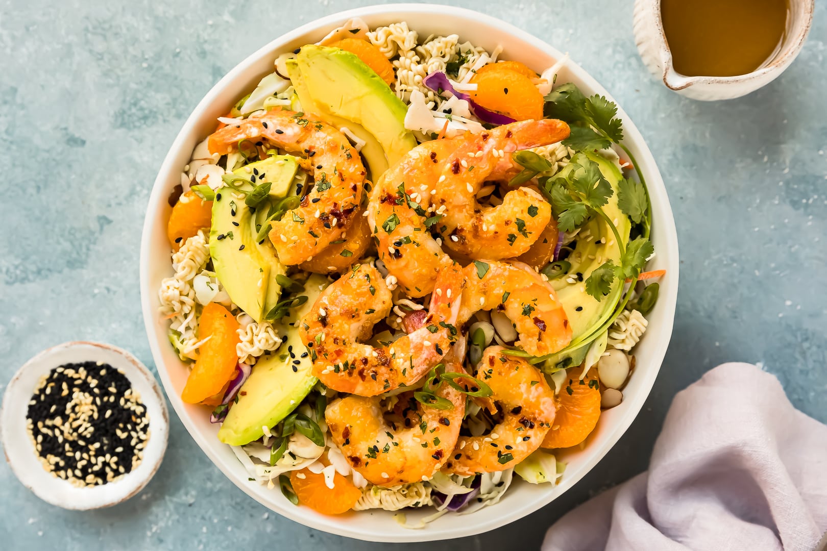 Overhead photo of a bowl of shrimp with ramen salad.