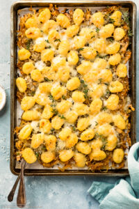 Photo of French Onion Gnocchi baked in the oven on one pan.