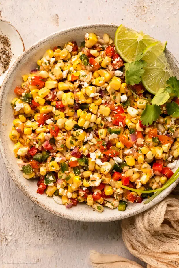 Overhead photo of a bowl of corn salsa topping for tacos.