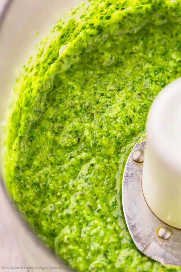 Close-up photo of basil pesto for couscous with veggies.