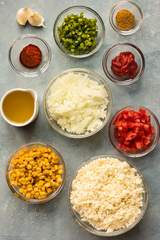 Overhead photo of the ingredients in cauliflower Mexican rice recipe.