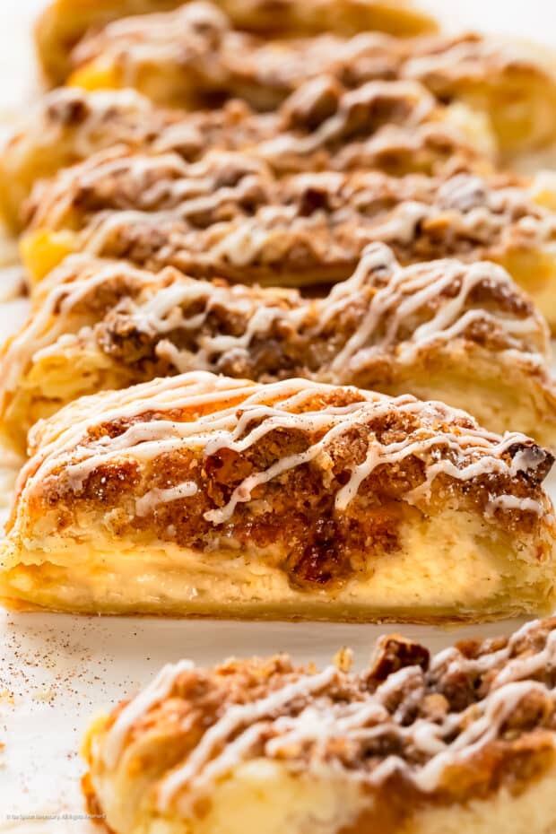 Close-up, straight on photo of the inside of a puff pastry danish.