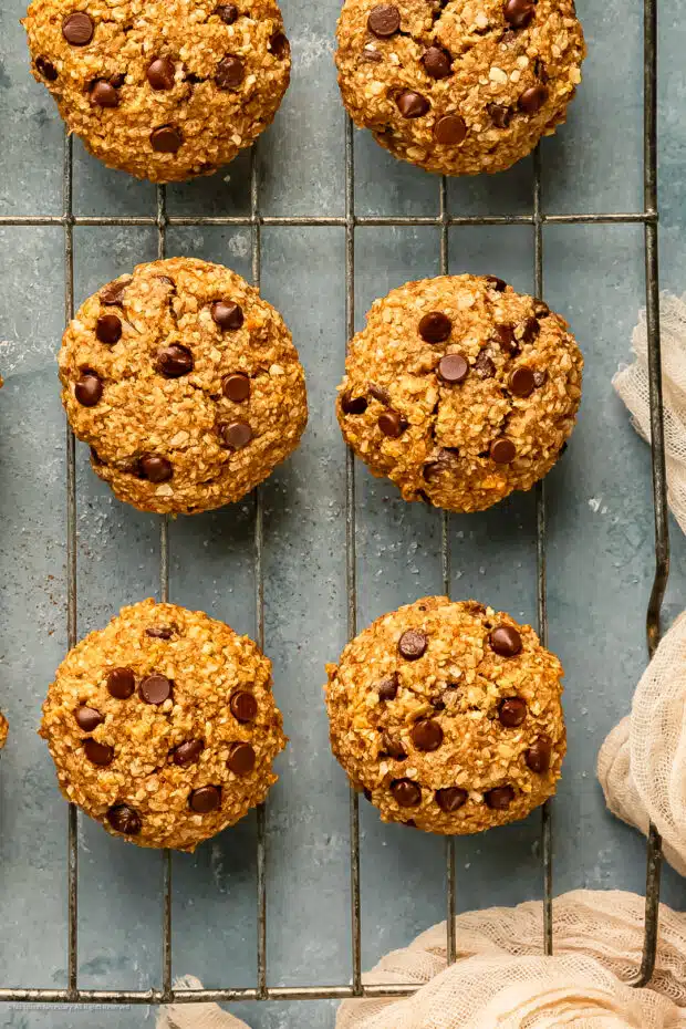 Close-up photo of four healthy banana cookies with oats.