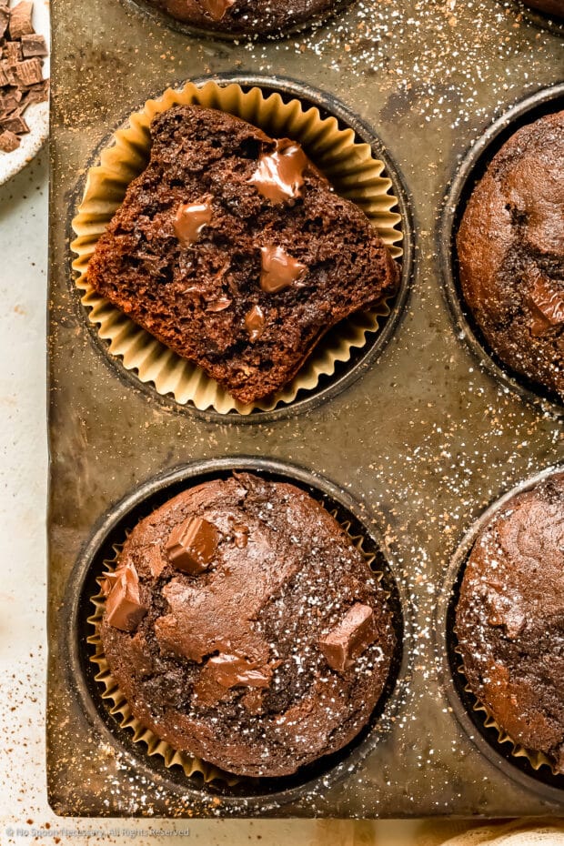 Overhead photo showing the fudgy inside of this double chocolate muffins recipe.