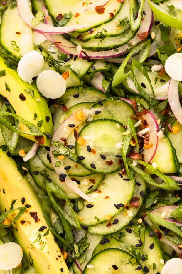 Overhead photo of Japanese Cucumber Salad with onion and sesame seeds.