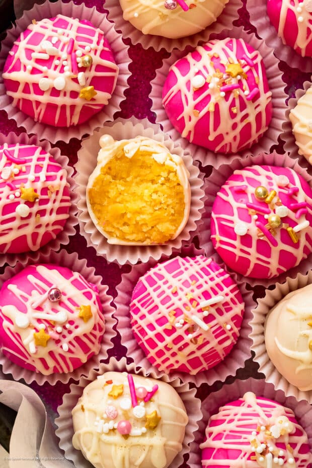 Close-up photo of the soft inside texture of this cake balls recipe.