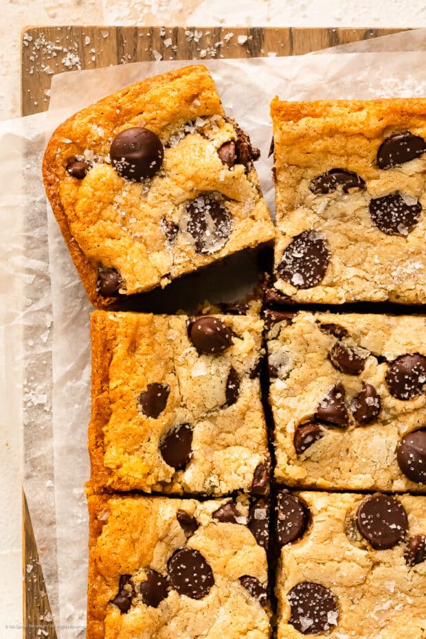 Overhead close-up photo a cake mix bar with chocolate chips and flaky sea salt. 