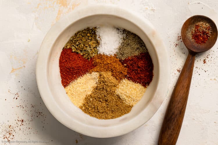 Overhead photo of the spices for fajita seasoning in a small bowl.