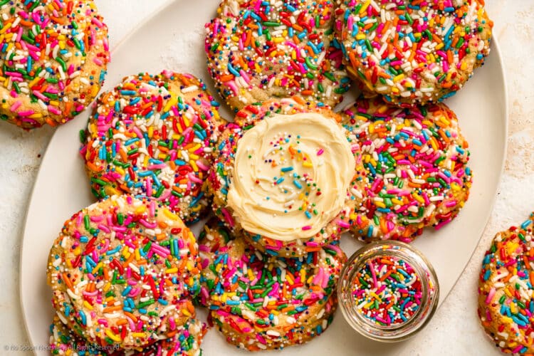 Overhead photo of funfetti cookies on a white serving tray.