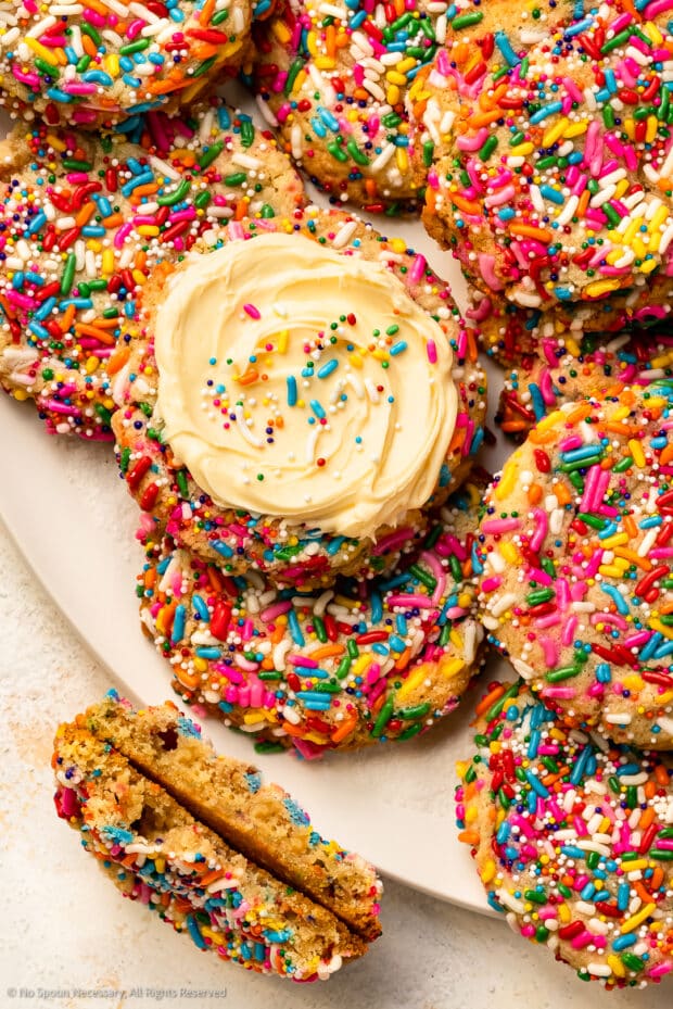 Overhead photo of sprinkle cookies with frosting.