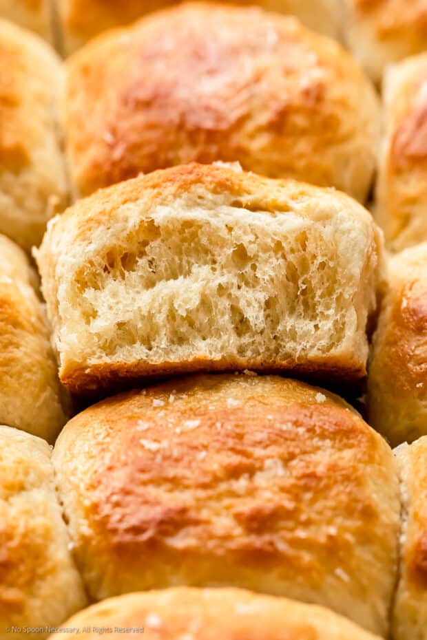 Close-up photo showing the soft texture of a homemade dinner roll.