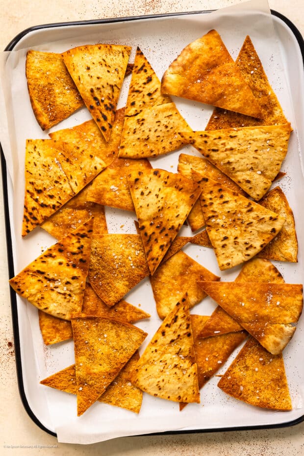 Overhead photo of a platter of homemade pita chips.