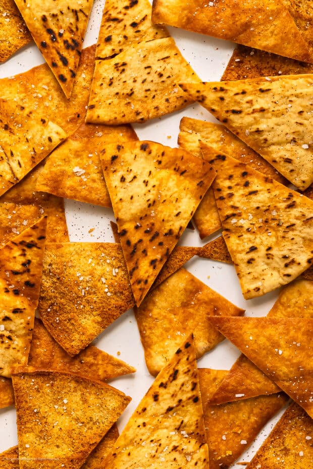 Close-up photo of a baked pita chip.