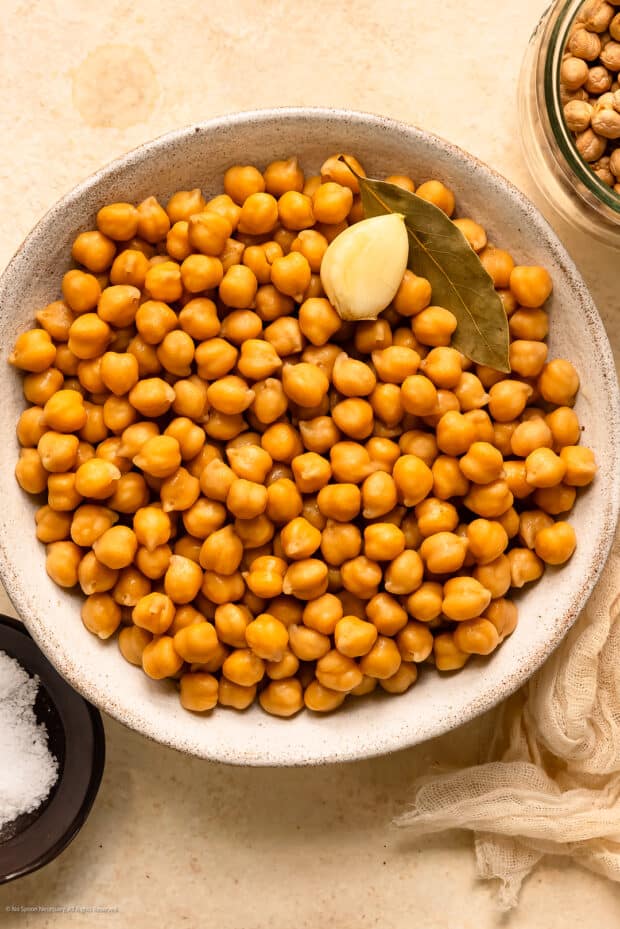 Overhead photo of a bowl of cooked chickpeas from dry.