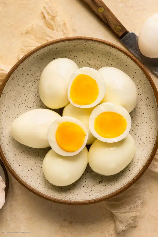 https://www.nospoonnecessary.com/wp-content/uploads/2023/08/Hard-Boiled-Eggs-That-Peel-Easy-620x929.jpg.webp