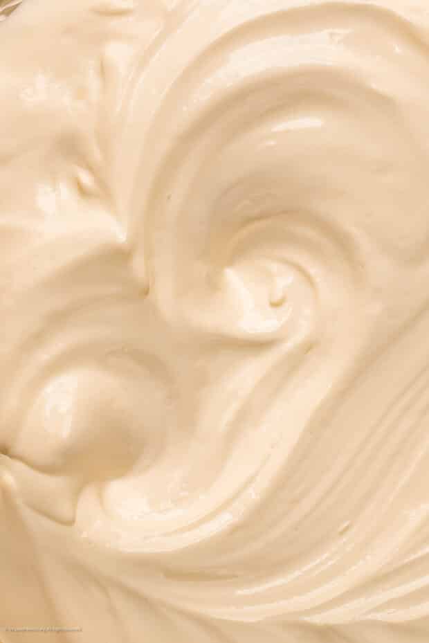 Close-up photo of the creamy texture of whipped cream yogurt.