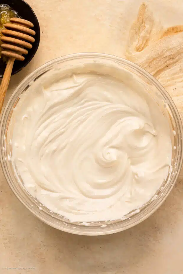 Overhead photo of freshly prepared yogurt whip in a large mixing bowl.