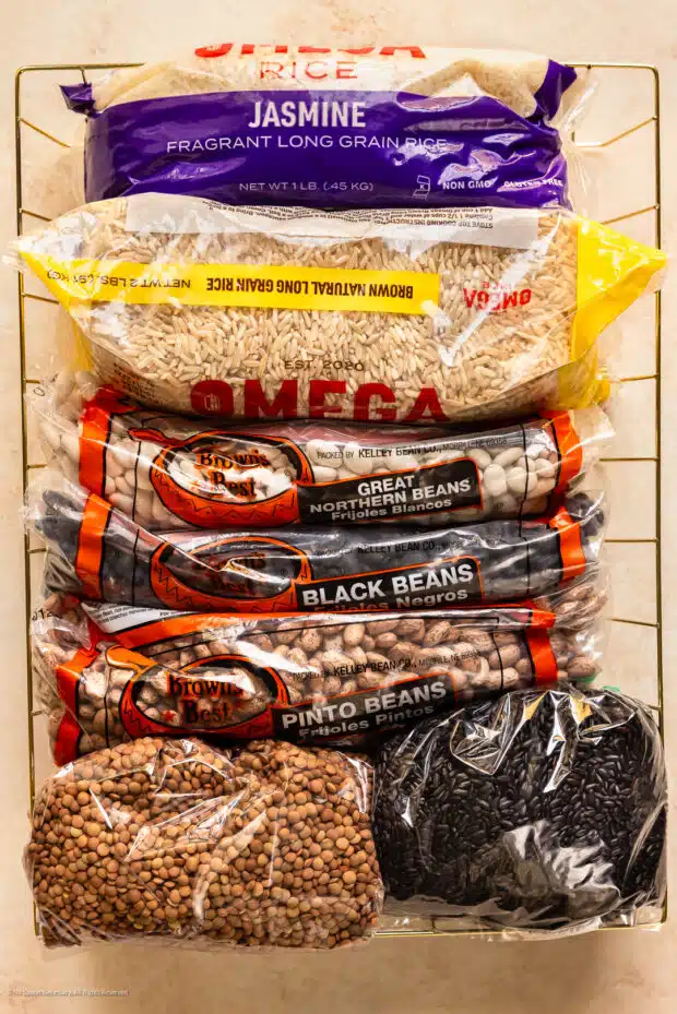 Overhead photo of dry rice and beans items for stocking the pantry.