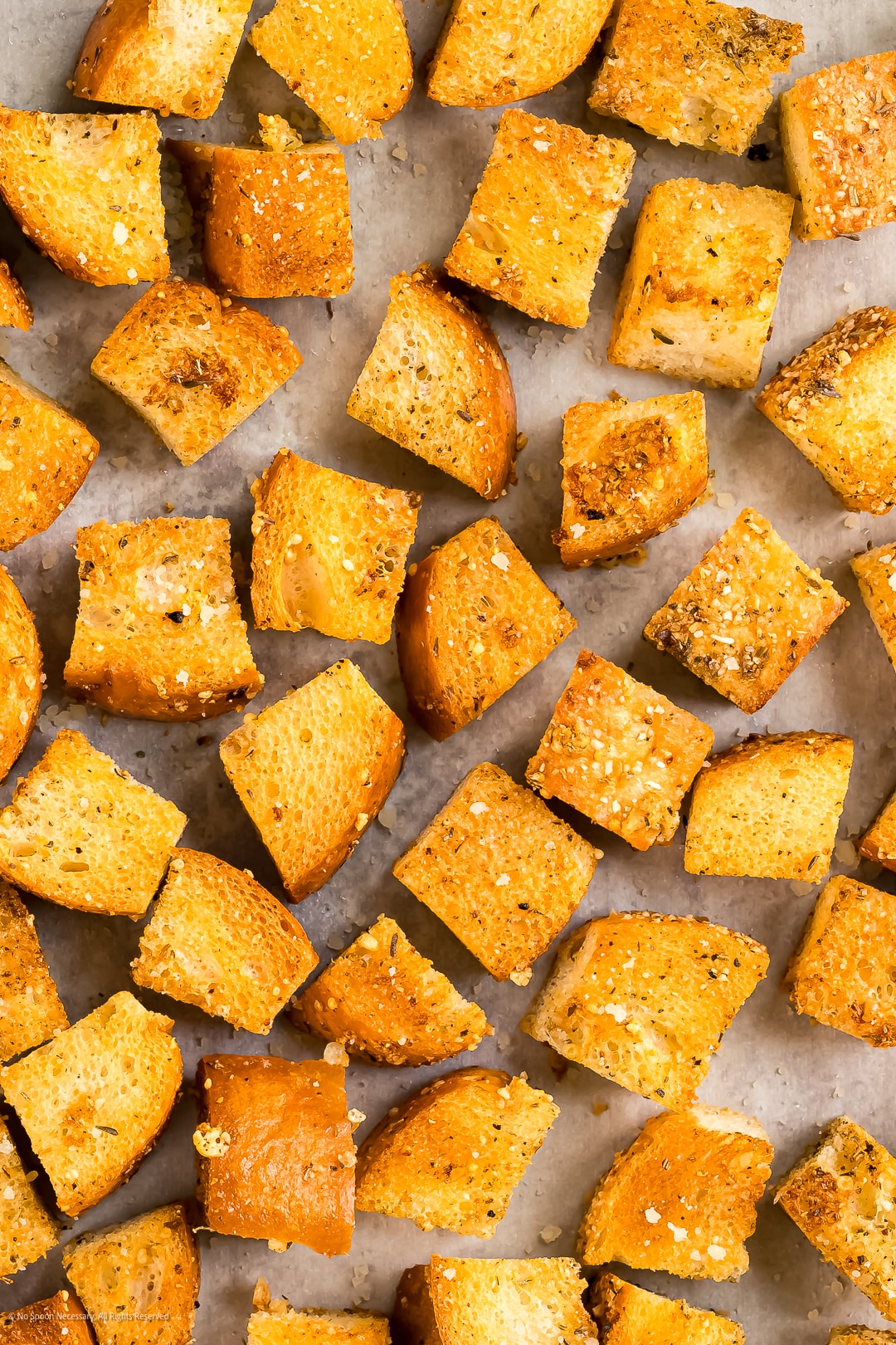 Close-up photo of homemade croutons made in the oven.